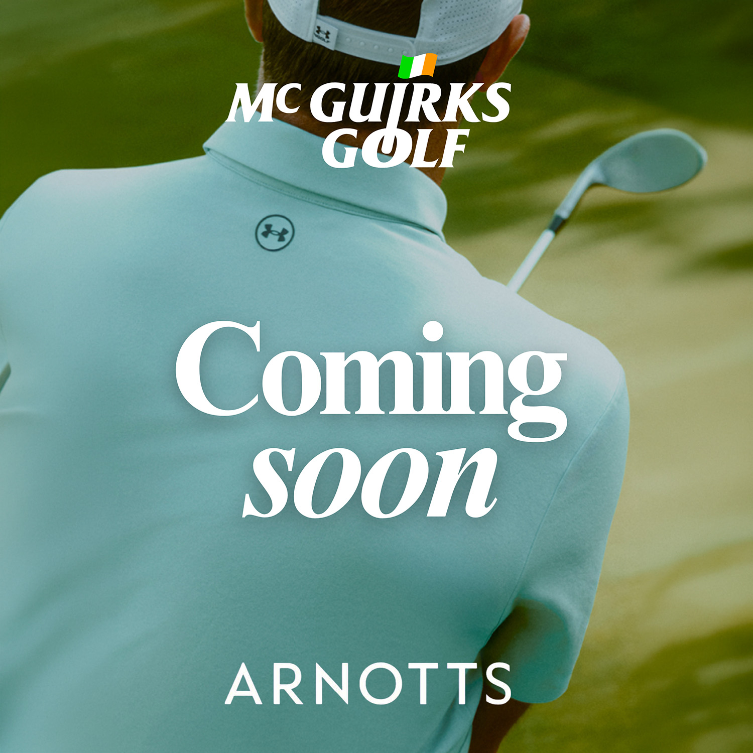 Golf ball on a green field with 'McGuirks Golf' text overlay and a distant flag.