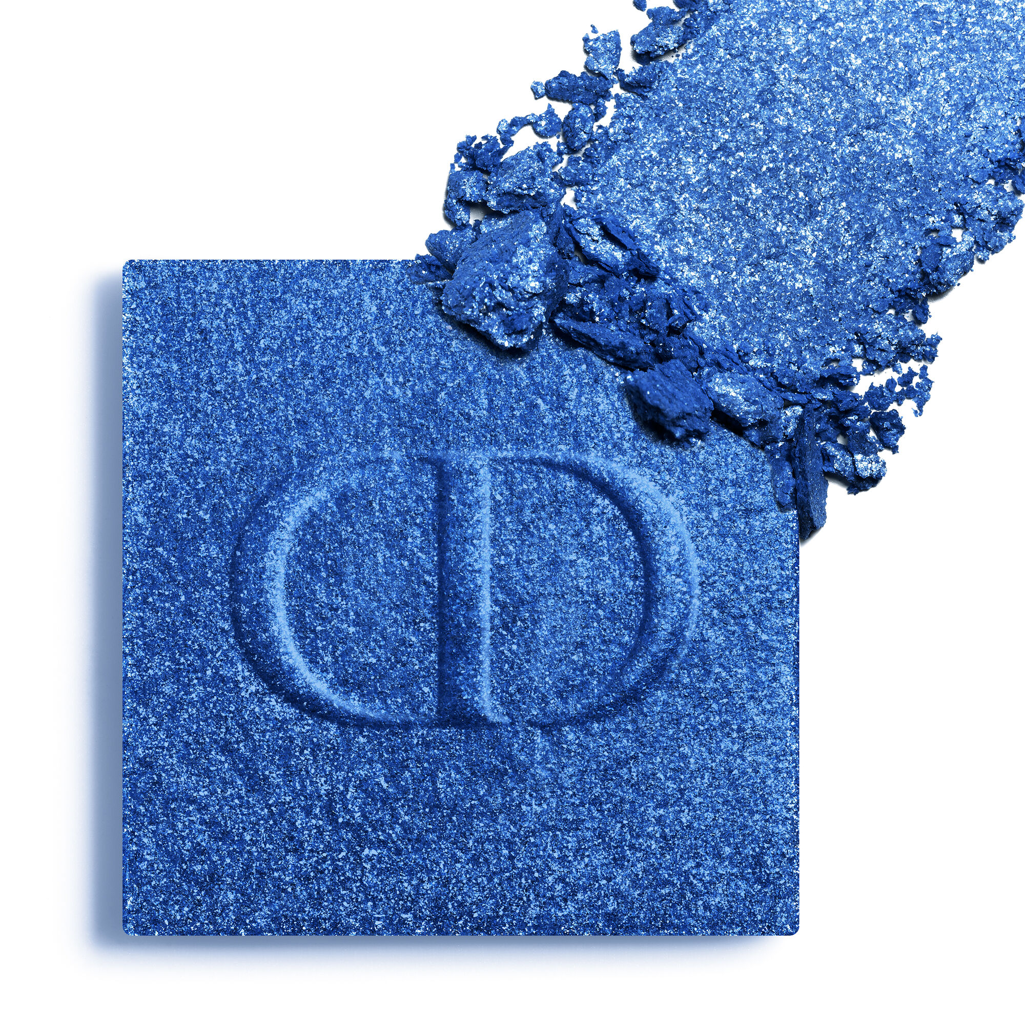 DIOR Diorshow Mono Couleur Couture eyeshadow in metallic cobalt blue, shown as compact pan with shimmer texture swatch beside it