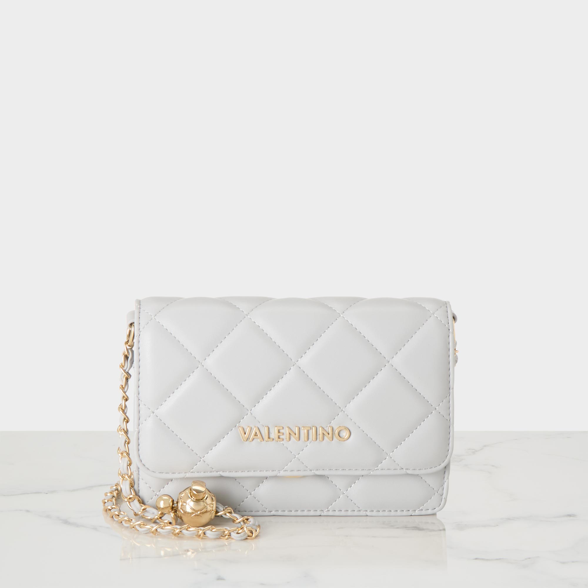 Ocarina Flap Crossbody Bag