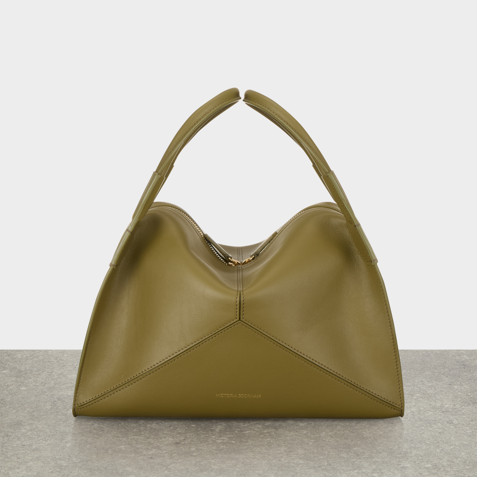 Victoria Pli&eacute; Top Handle Bag