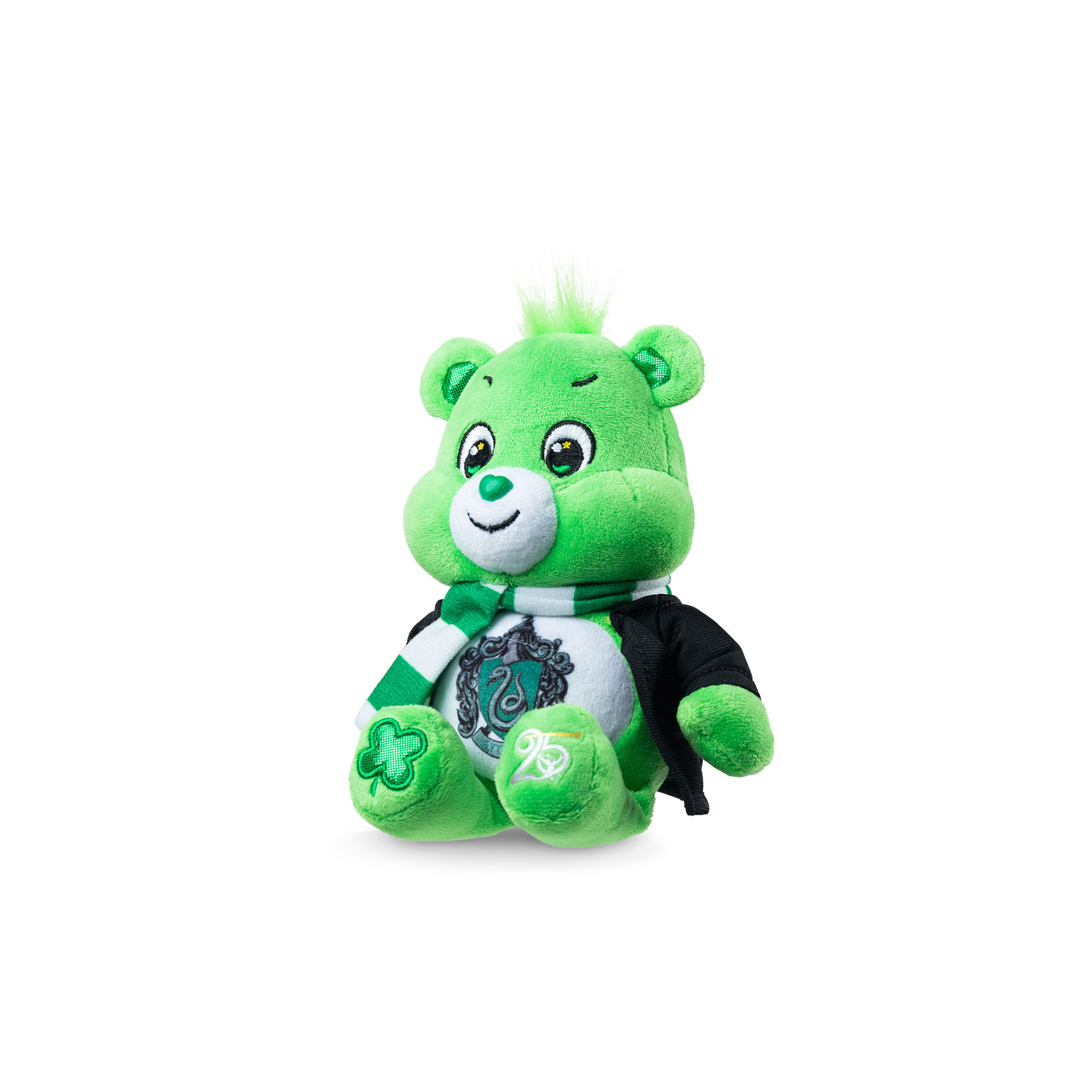Care Bears green plush bear wearing a black cape with Slytherin crest, small green hair tuft, seated pose, approximately 9-inch size