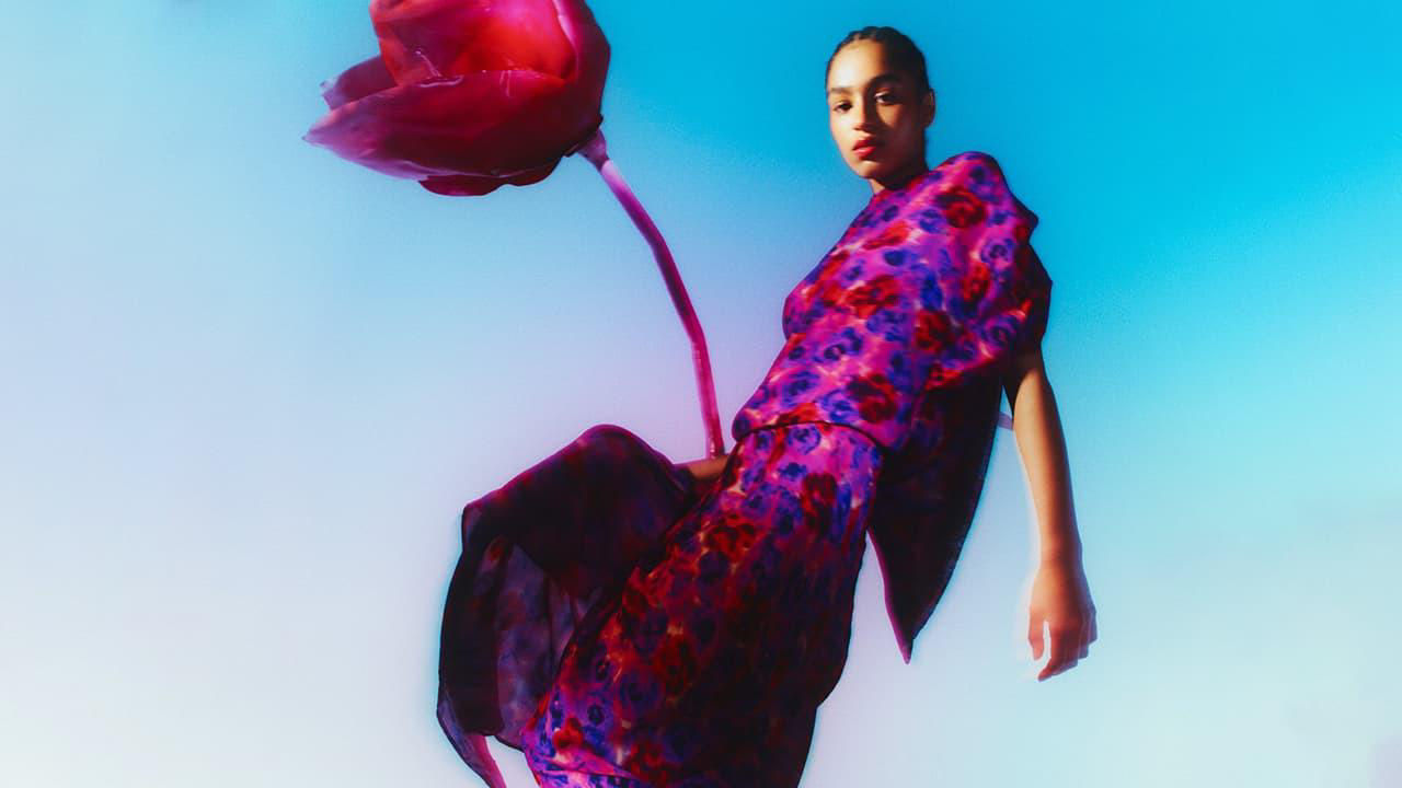 woman in colourful floral dress