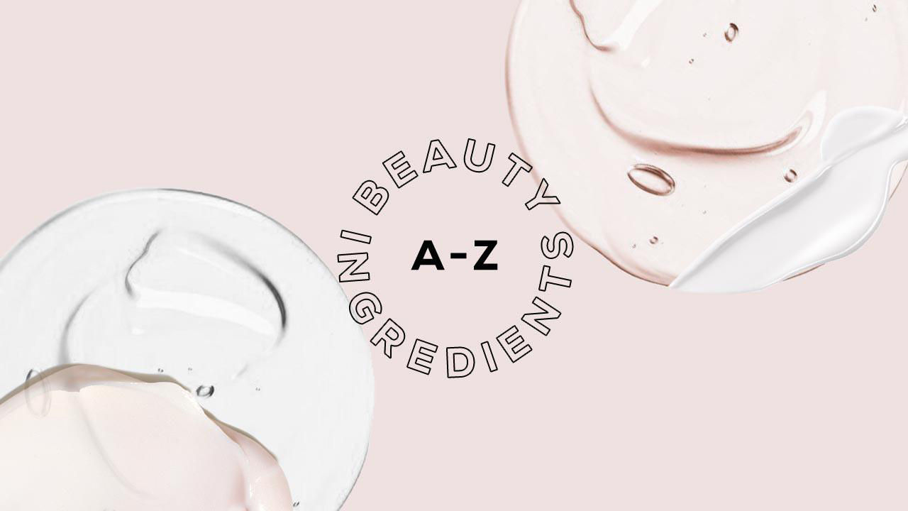 Text 'BEAUTY INGREDIENTS A-Z' surrounded by circular swirls of clear and pink cream on a light pink background.



