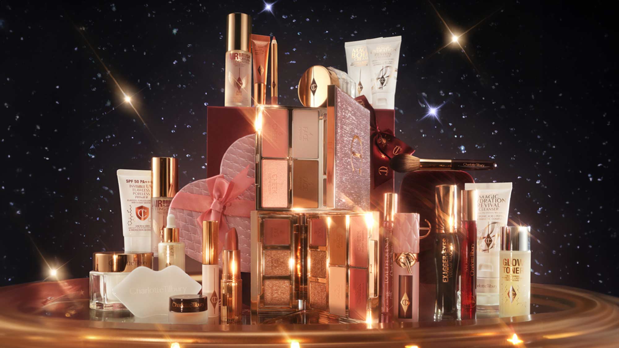 A collection of luxury makeup and skincare products displayed on a luminous surface with a starry background.