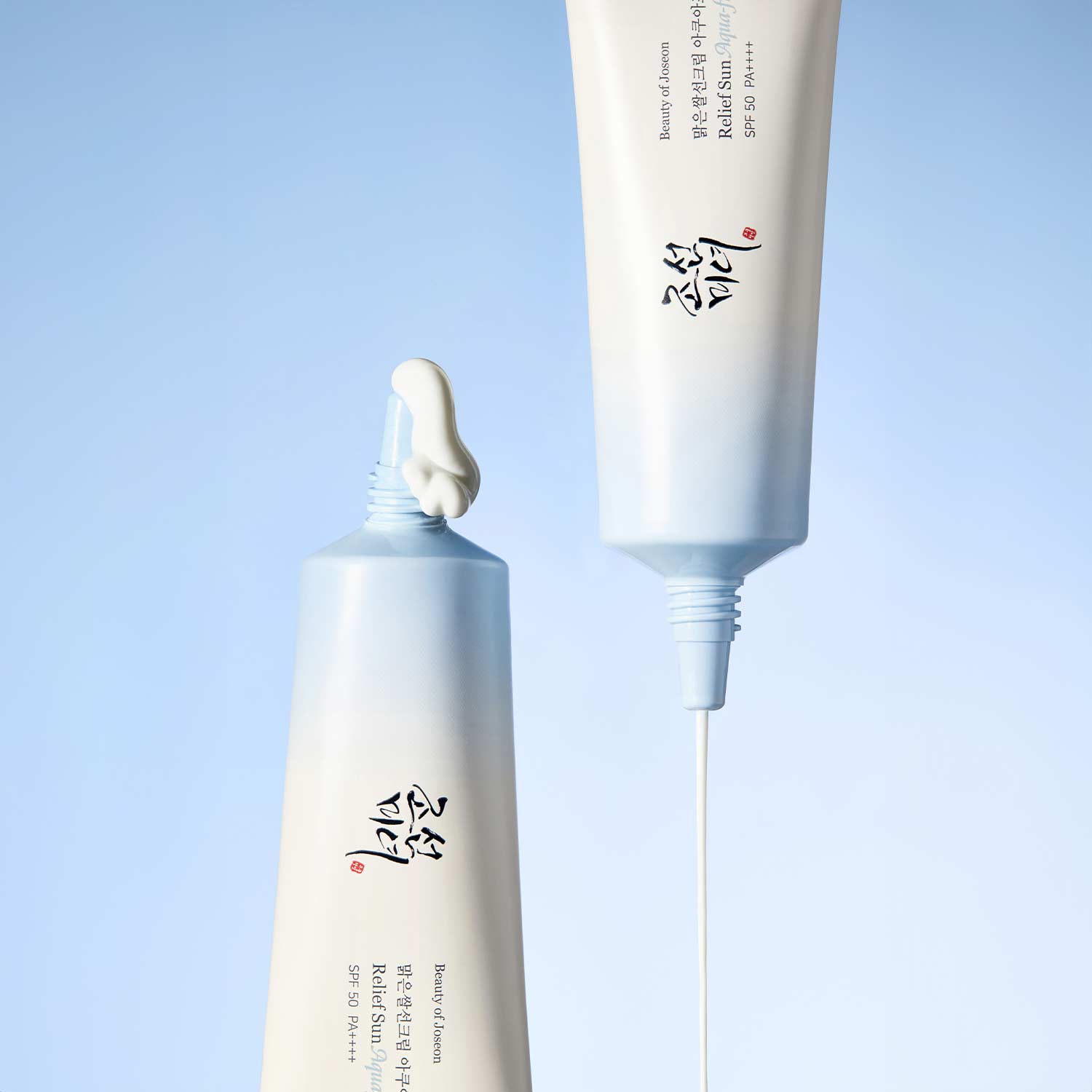 Sunscreen and SPF skincare products with blue sky background