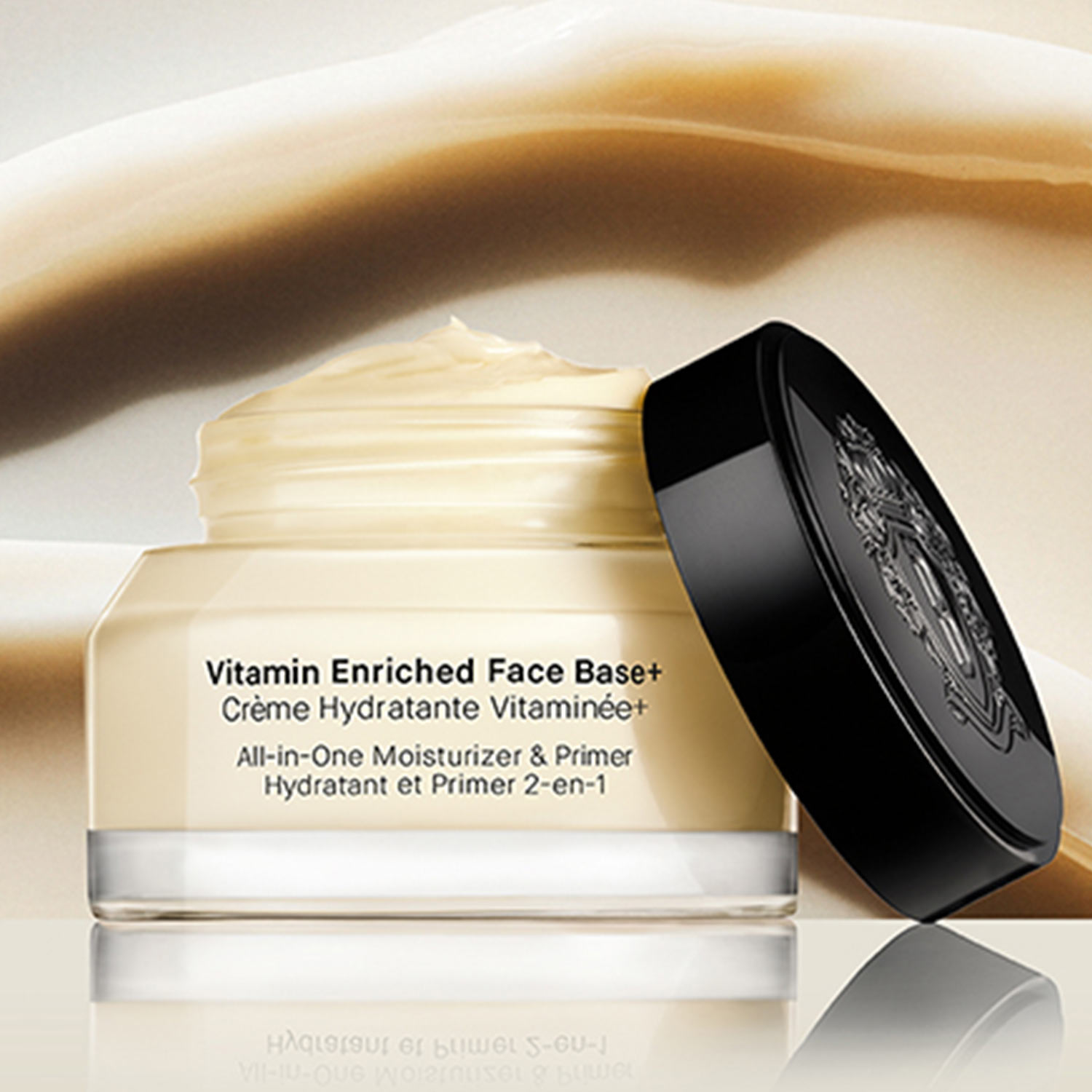 Luxury face cream jar with black lid displayed with open lid showing vitamin-enriched moisturiser formula.