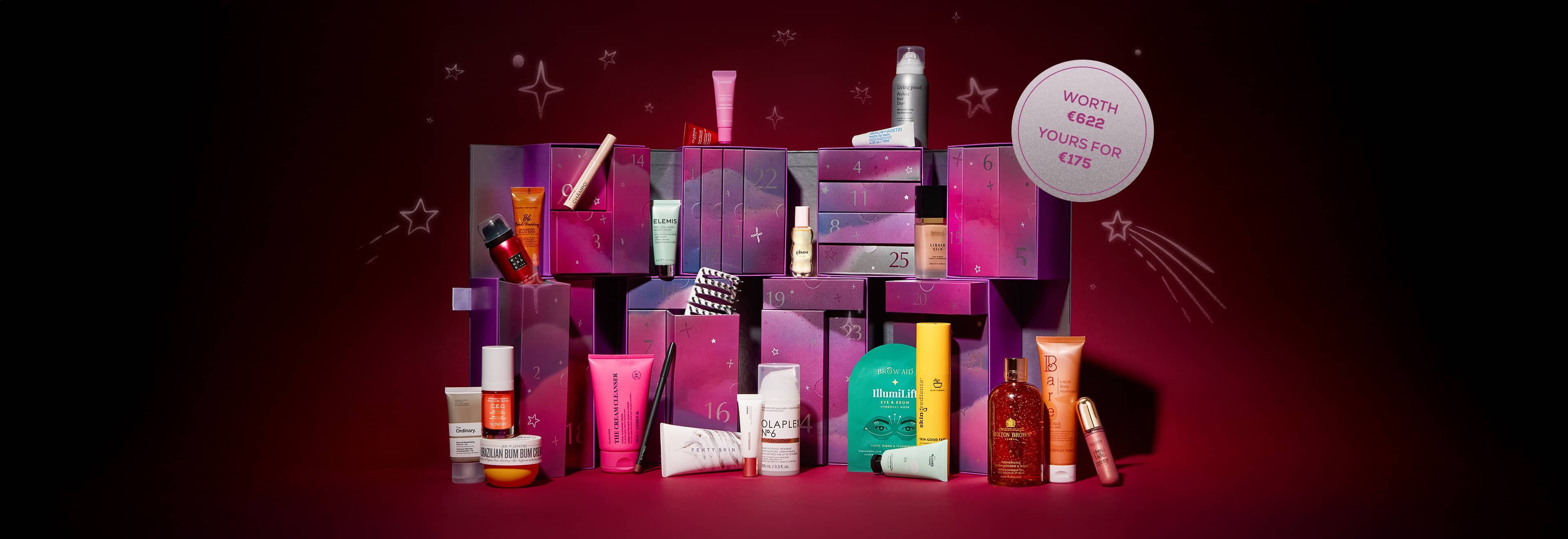Assorted beauty and skincare products displayed against a starry, purple backdrop with boxes and a “Worth €622 Yours For €175” label.