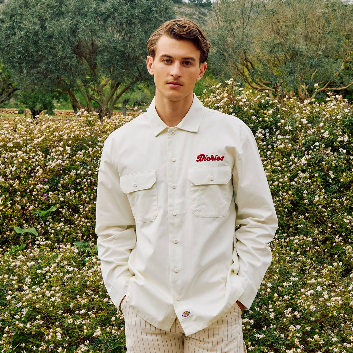 man in shirt by the pool