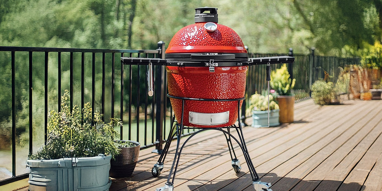 Red kamado joe bbq grill outdoors