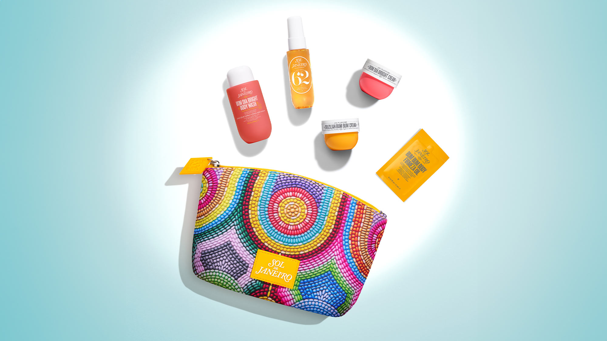 Colorful pouch with skincare products, including bottles and jars, arranged in a circle.