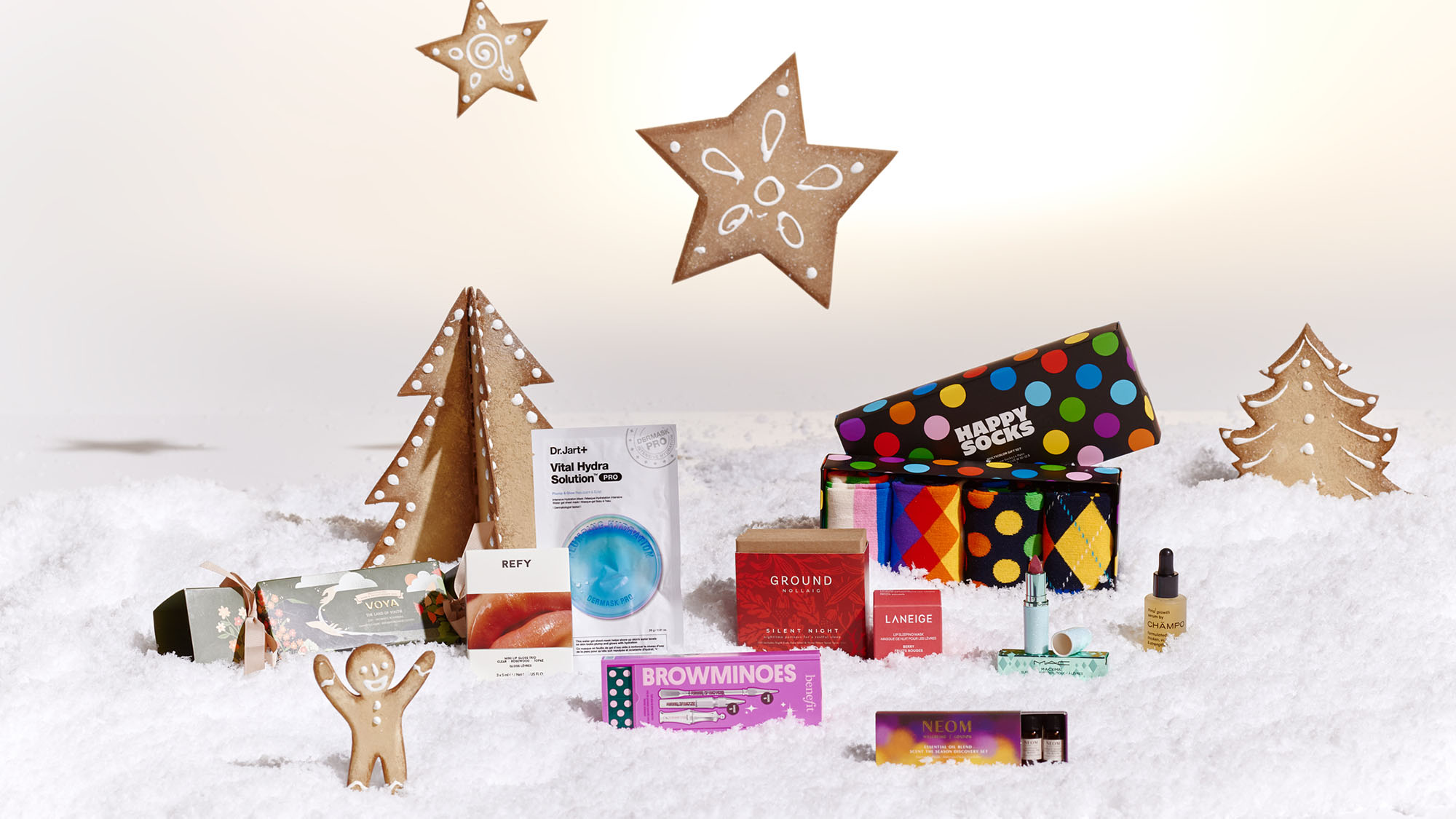 Stocking Fillers gifts with gingerbread and snow.
