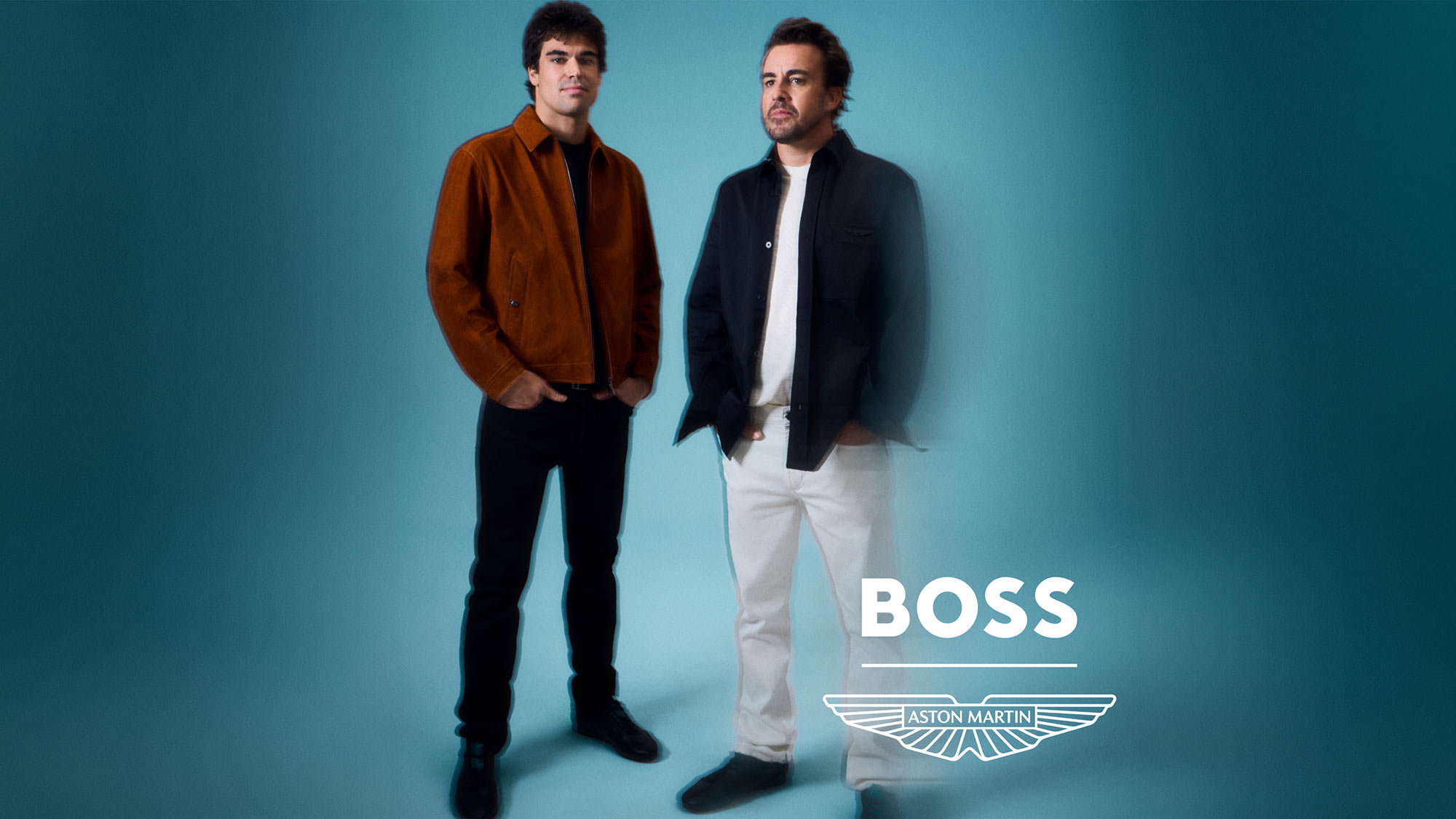 Two men wearing BOSS and Aston Martin menswear: one in a rust-coloured jacket with black trousers, the other in a navy cardigan with white trousers