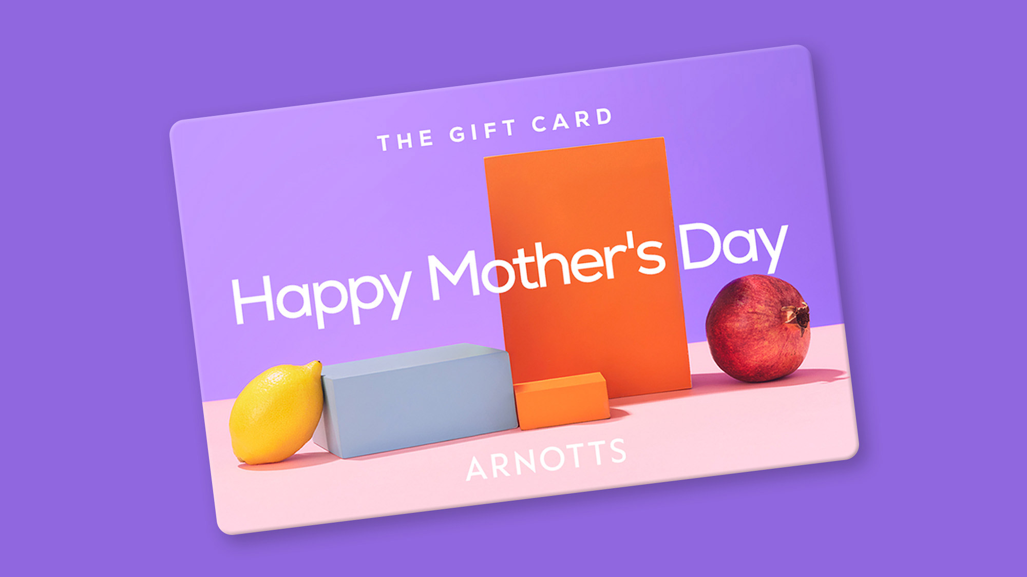 A colorful Mother's Day gift card with geometric shapes and fruits on a purple background, featuring the text 'Happy Mother's Day' and 'ARNOTTS.'