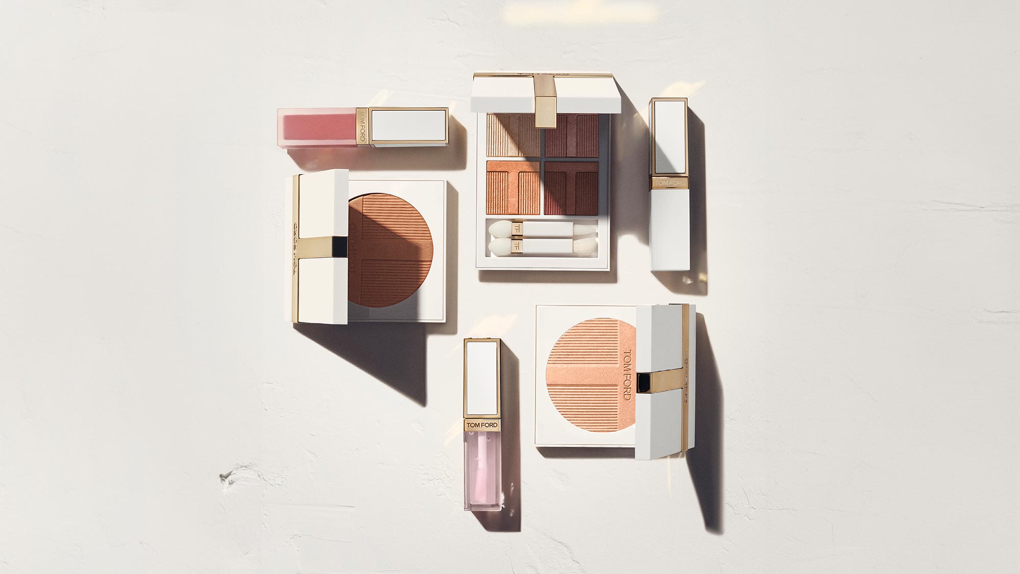 Tom Ford Soleil collection featuring makeup palettes, liquid lipstick and bronzed beauty products