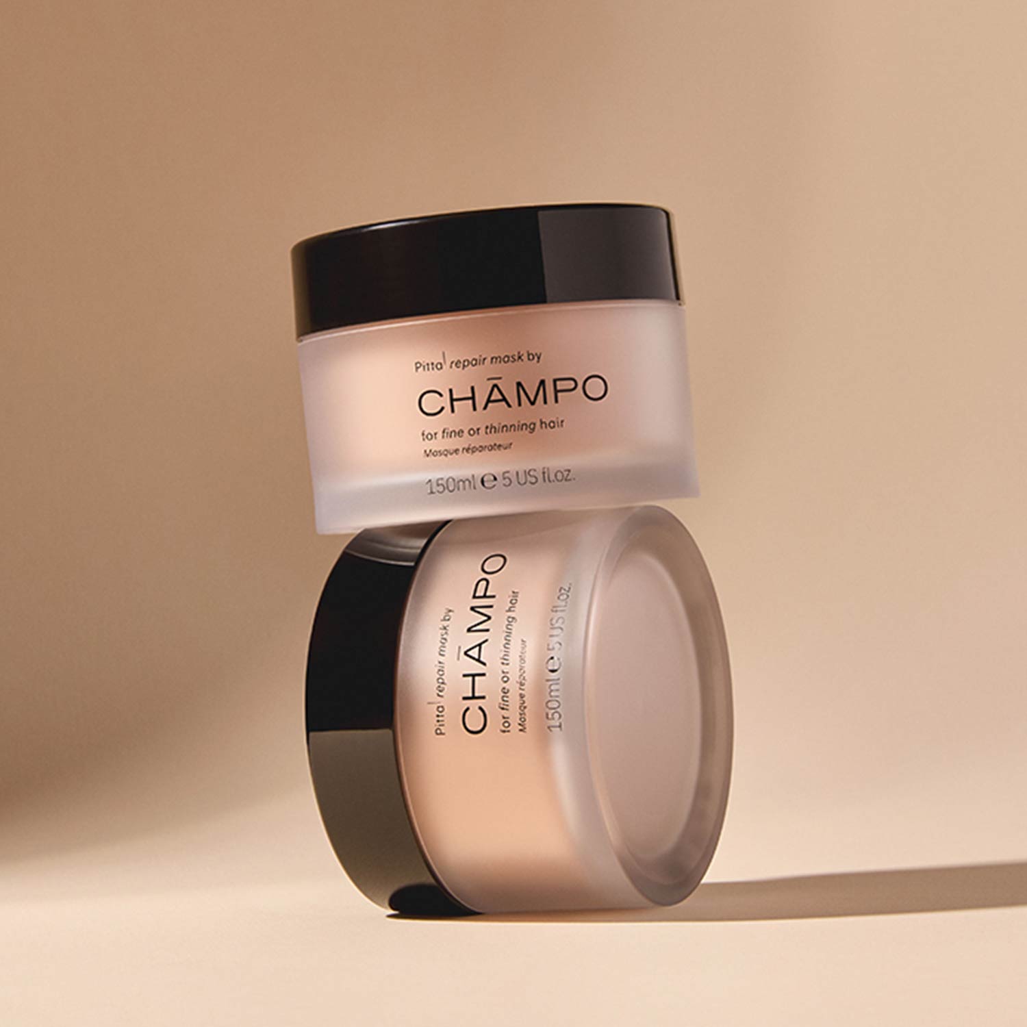 Two Champo Pitta repair mask containers for fine and thinning hair on neutral beige background