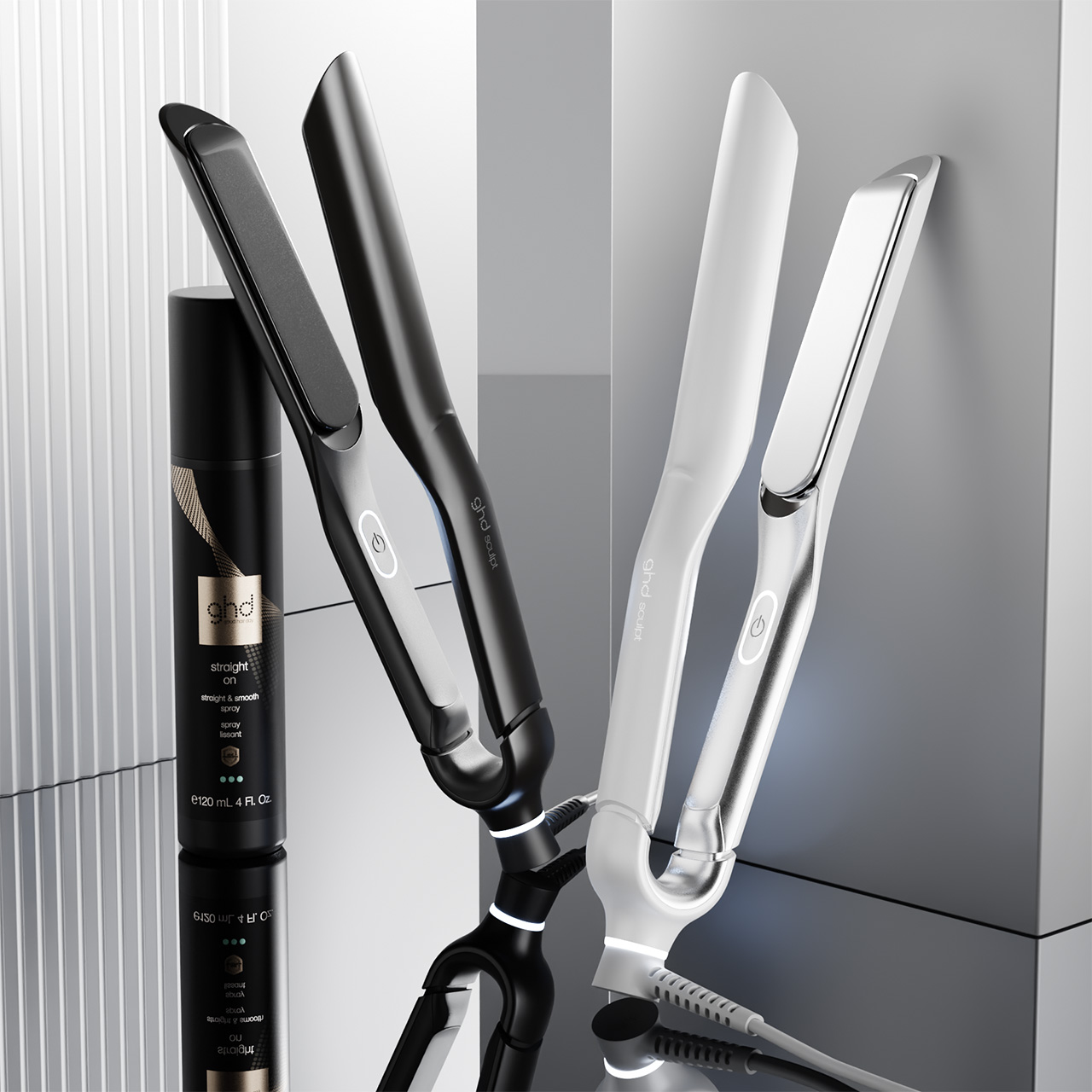 ghd Sculpt Interactive Hair Straighteners in black and white, displayed with styling spray on neutral background
