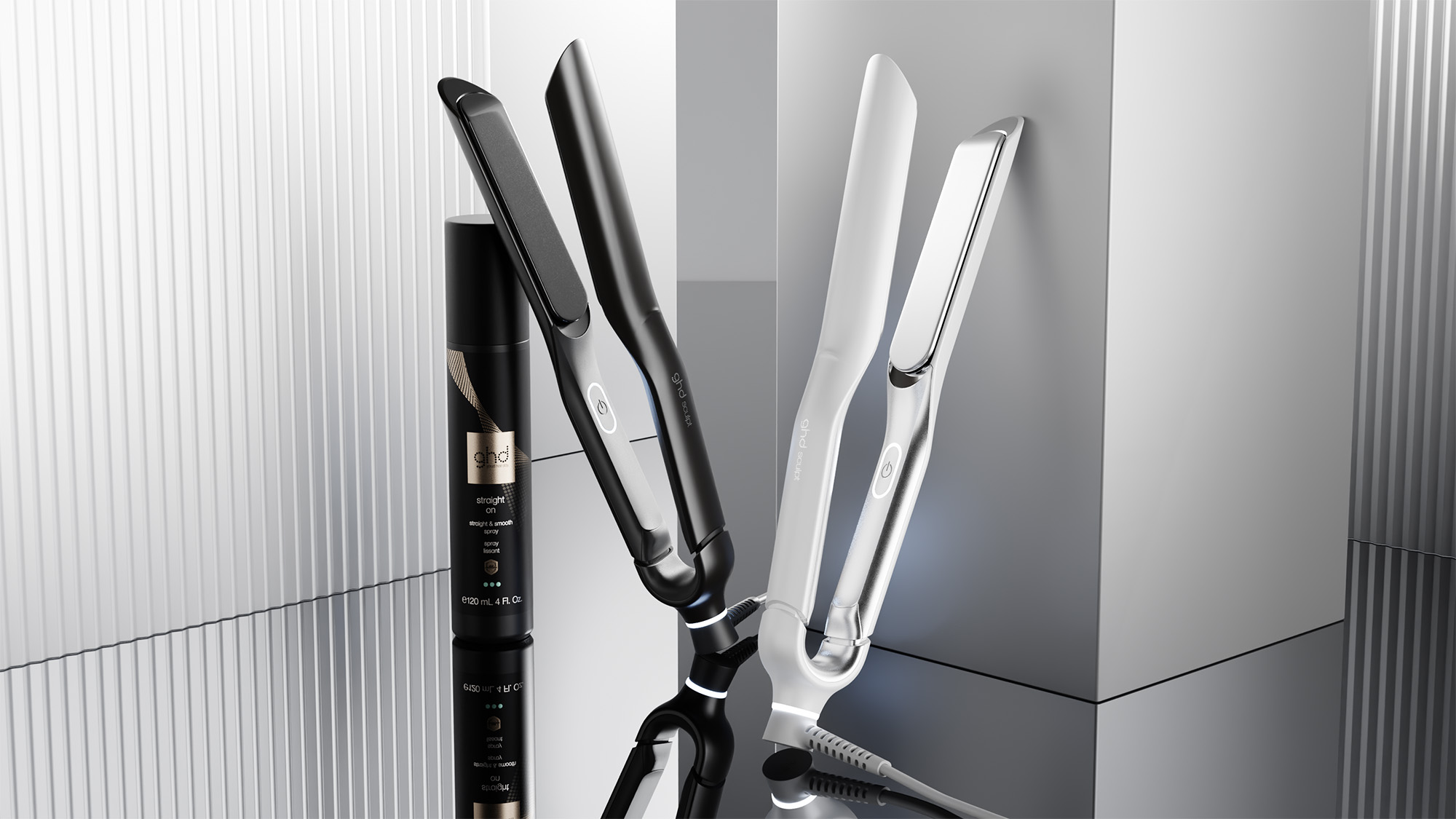 ghd Sculpt Interactive Hair Straighteners in black and white, displayed with styling spray on neutral background