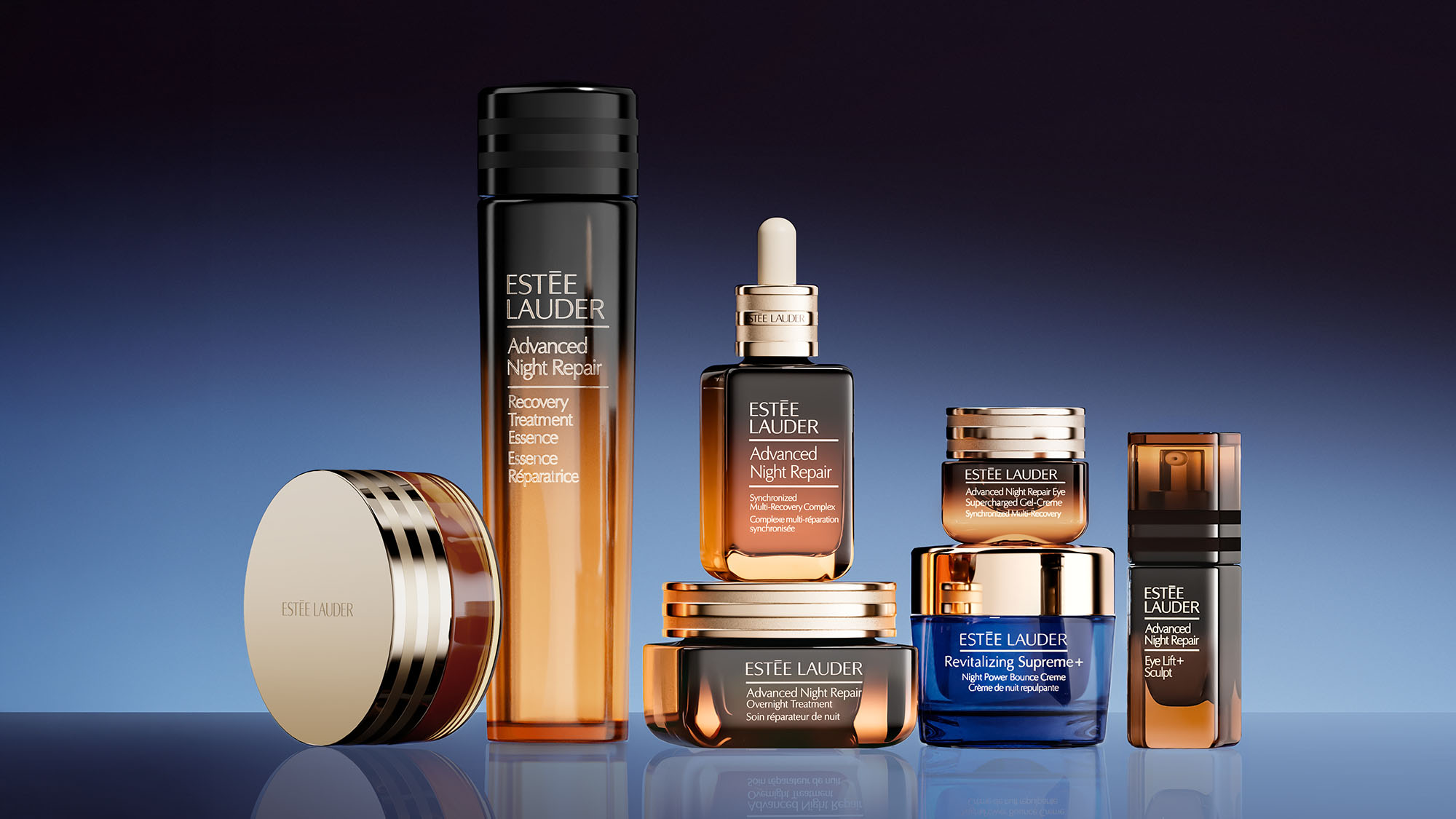 Estée Lauder Advanced Night Repair collection featuring serums, essences, creams and eye treatments in amber and blue bottles