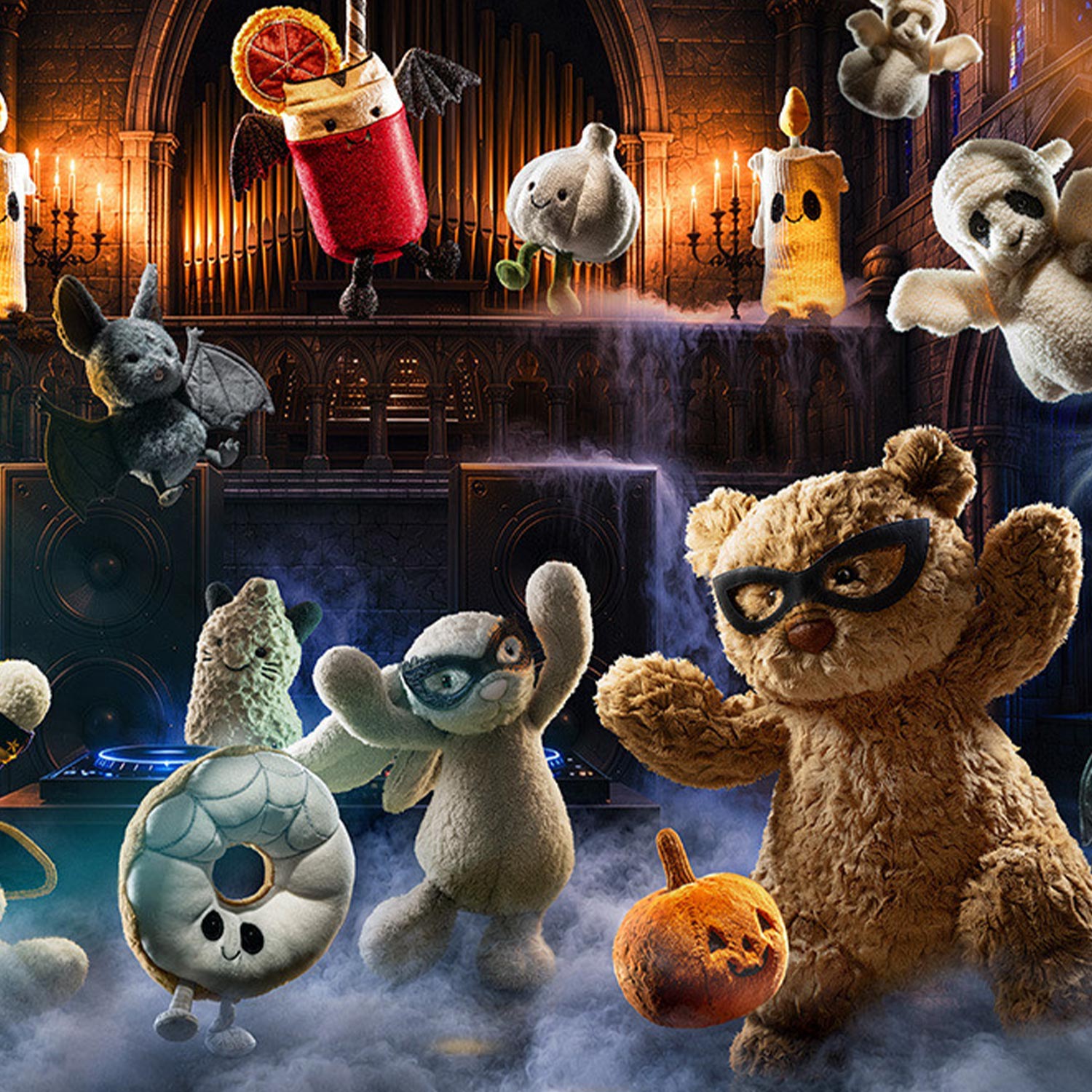 Jellycat plush toys dressed in Halloween costumes celebrating in gothic cathedral setting with festive decorations