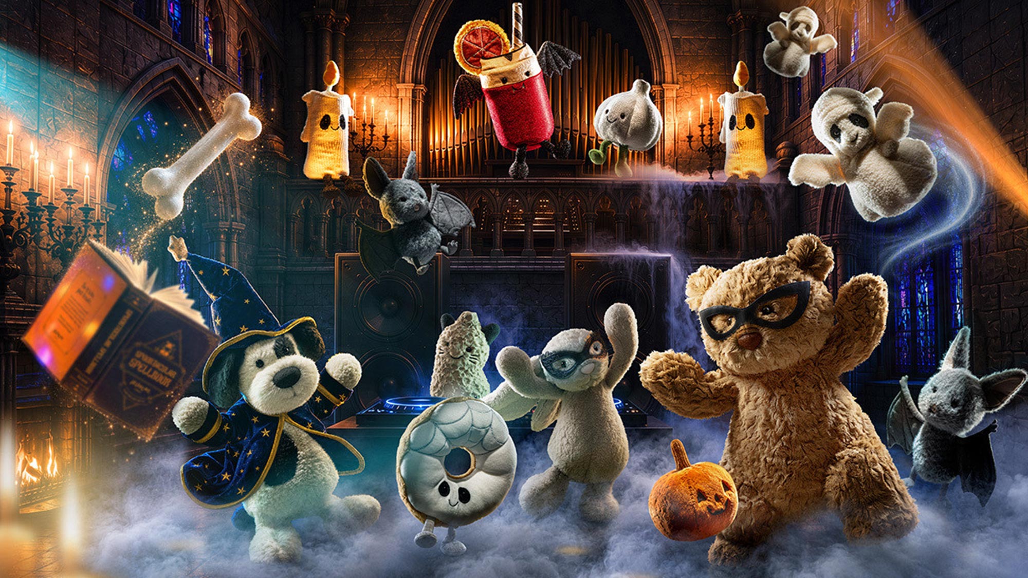 Jellycat plush toys dressed in Halloween costumes celebrating in gothic cathedral setting with festive decorations