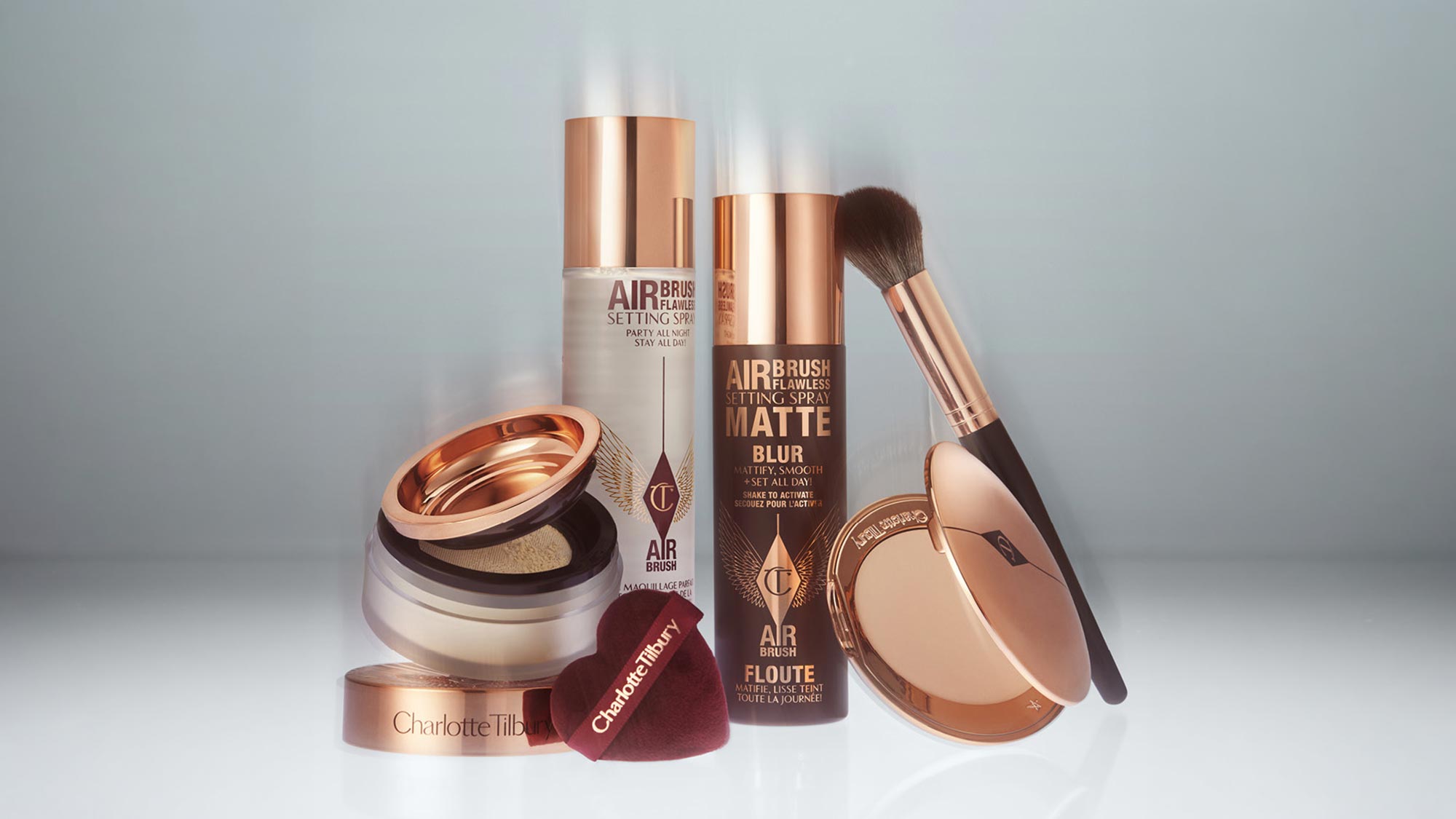 Charlotte Tilbury airbrush flawless beauty collection with setting sprays, powder and makeup brushes