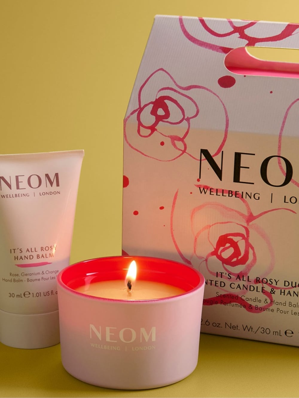 Two pink metallic cylindrical objects with a smooth surface.