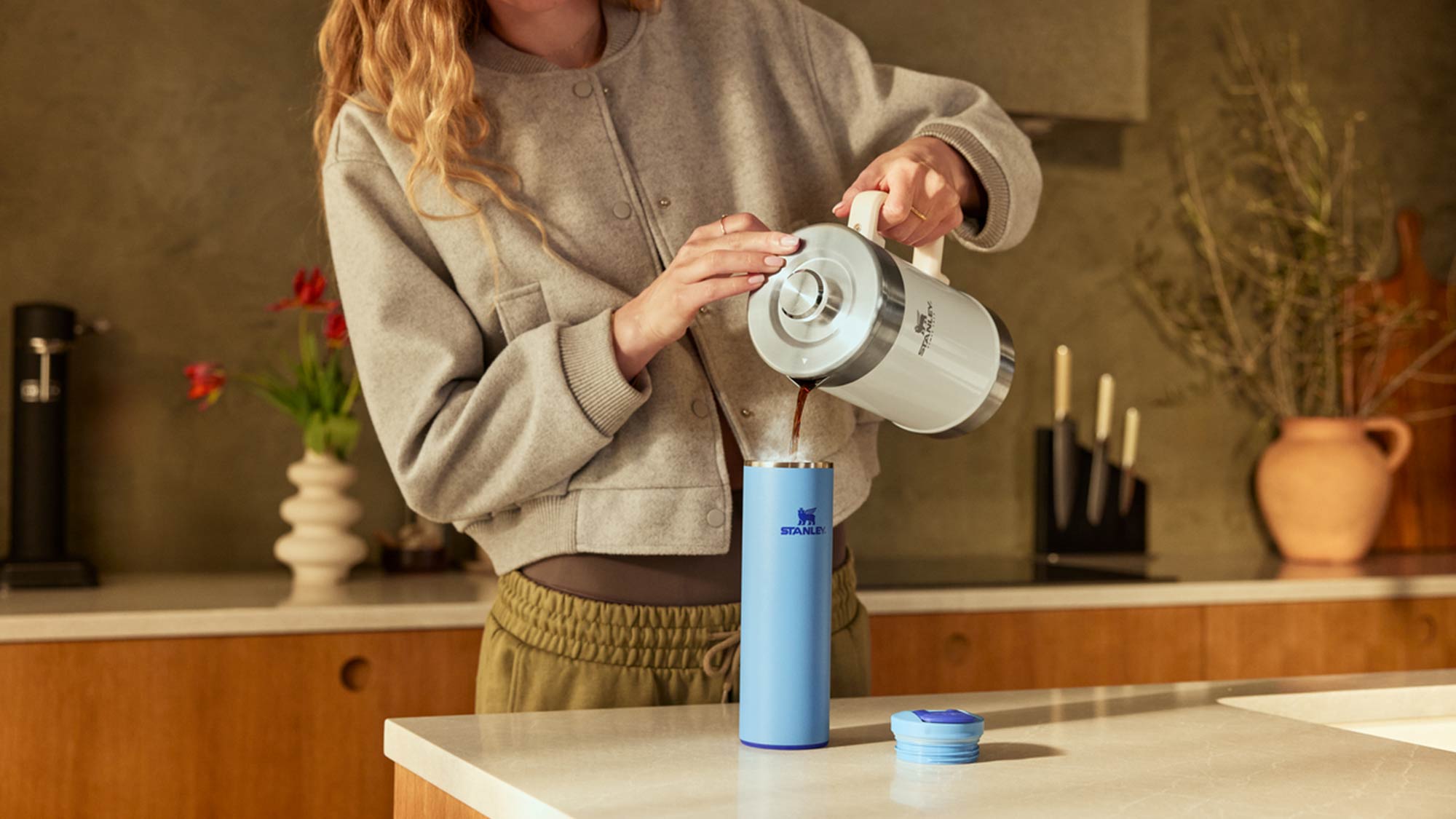 Stanley reusable water bottles in vibrant summer colours for hydration