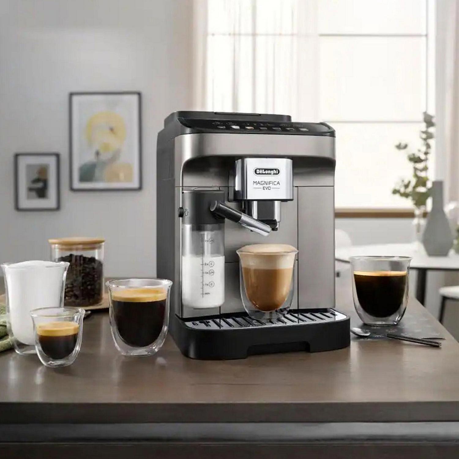 DeLonghi Magnifica Evo automatic coffee machine with espresso cups and coffee beans displayed on kitchen counter