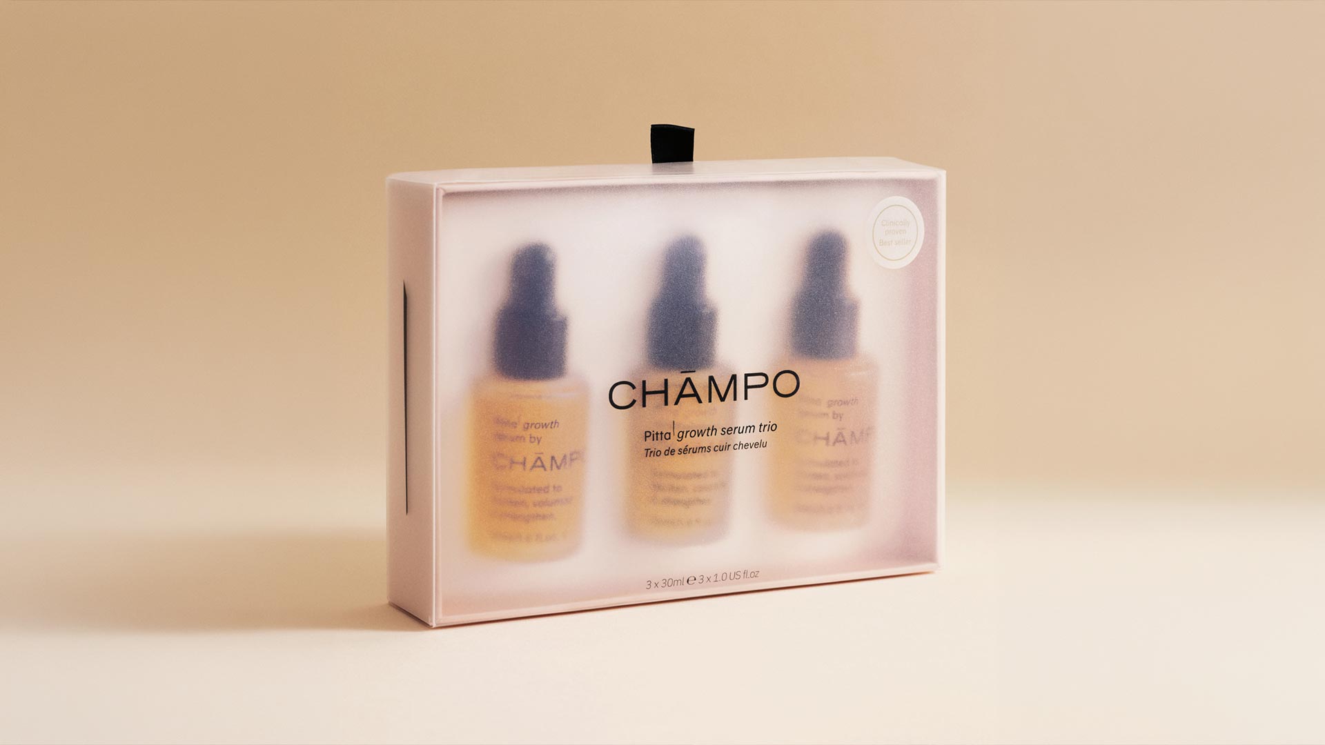 Champo Pilla growth serum trio gift set in pink packaging with three serum bottles