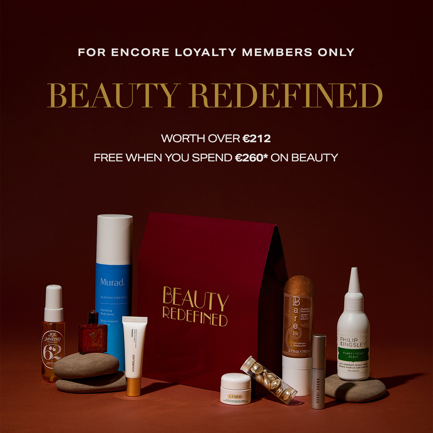 A display of various beauty products with an offer for Encore Loyalty Members, featuring a red box labeled 'Beauty Redefined.'