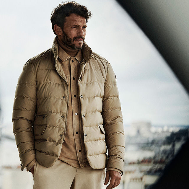 man wearing a beige jacket