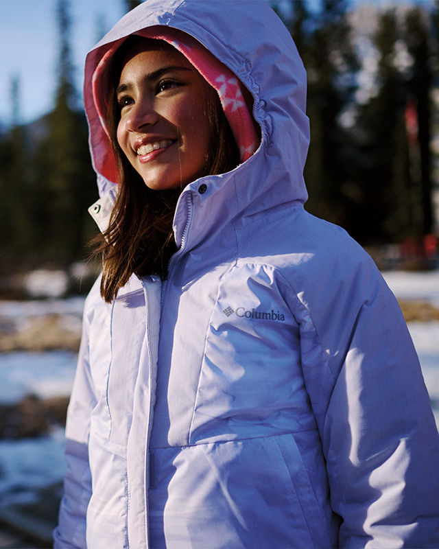 child wearing a purple Columbia jacket