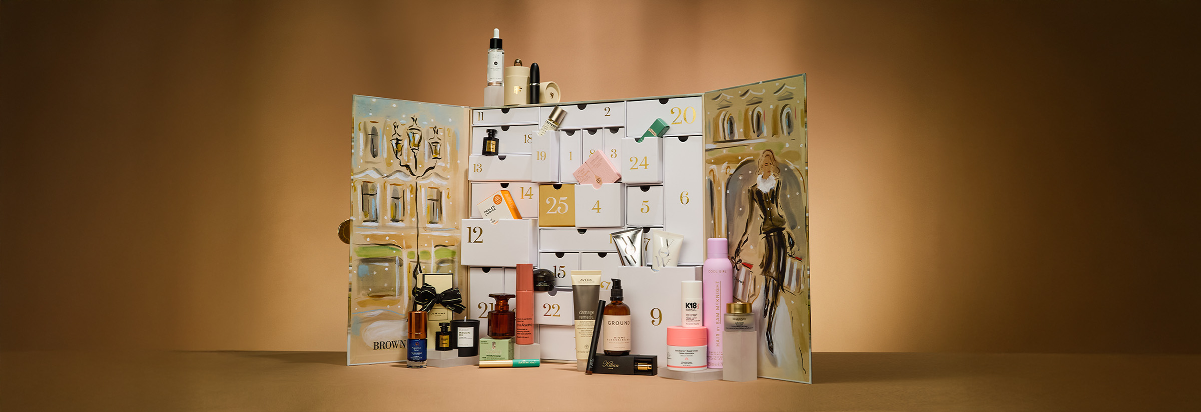 A lit advent calendar with numbered doors and illustrated background, revealing small items behind some doors.