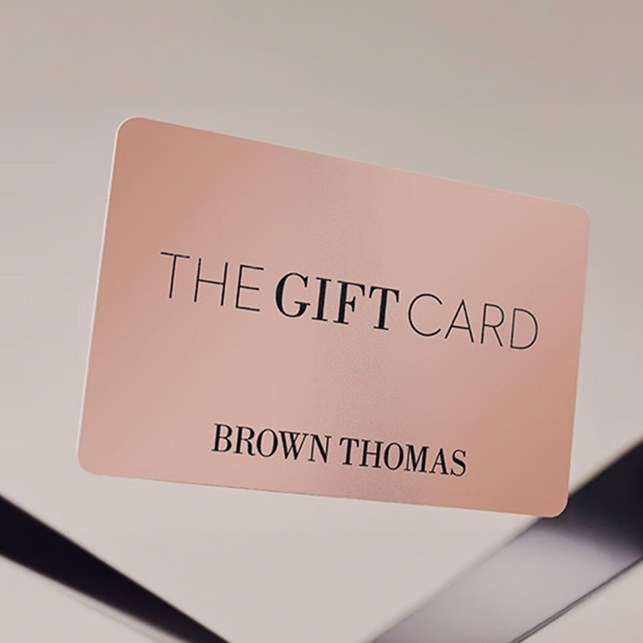 A Brown Thomas gift card with a sleek design.