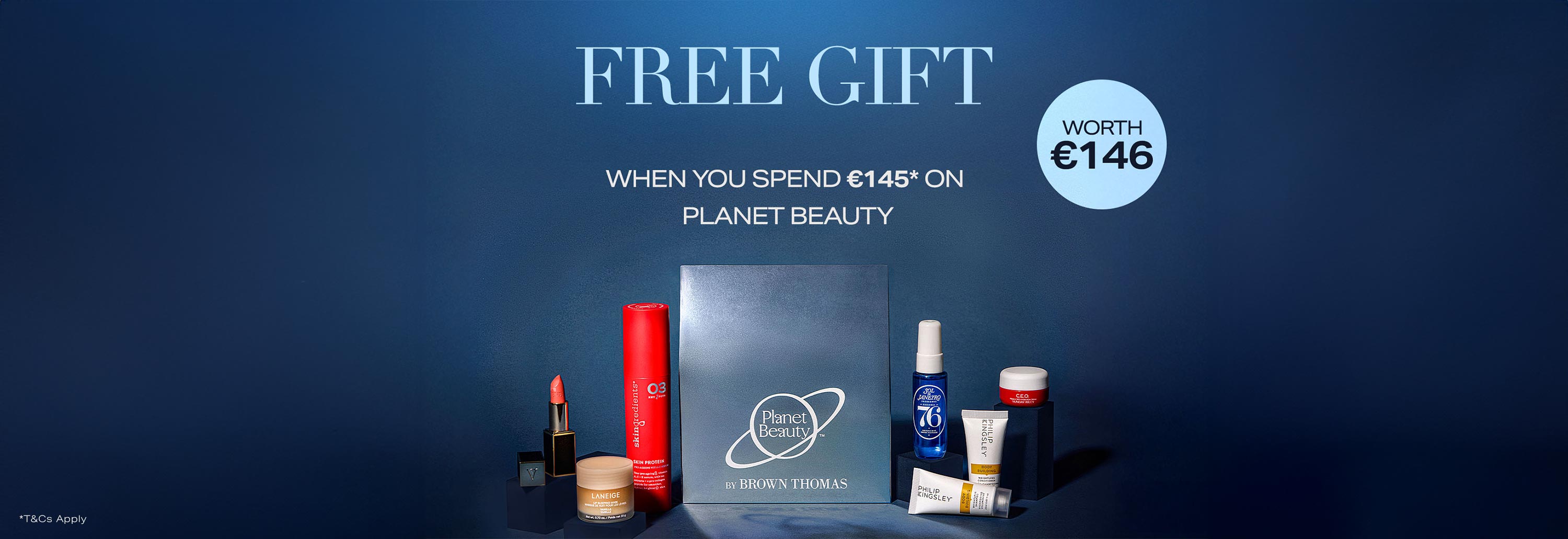 Assorted beauty products displayed with text offering a free gift for spending on beauty items.