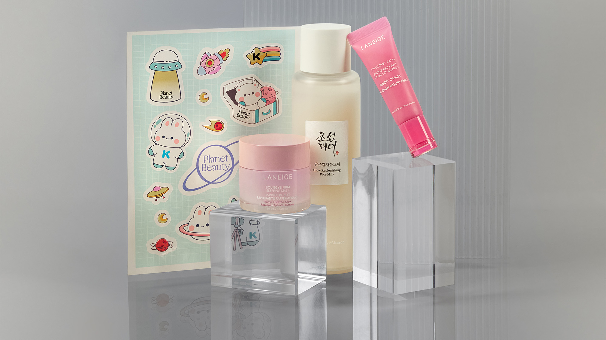 A collection of various skincare and beauty products arranged on a surface.