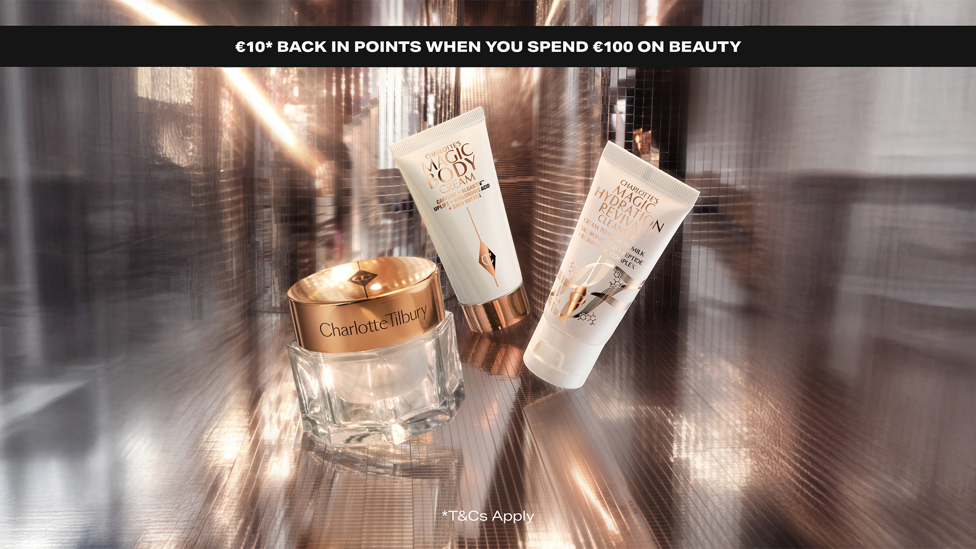 Charlotte Tilbury beauty products displayed with a promotional offer: €10 back in points for spending €100 on beauty items.