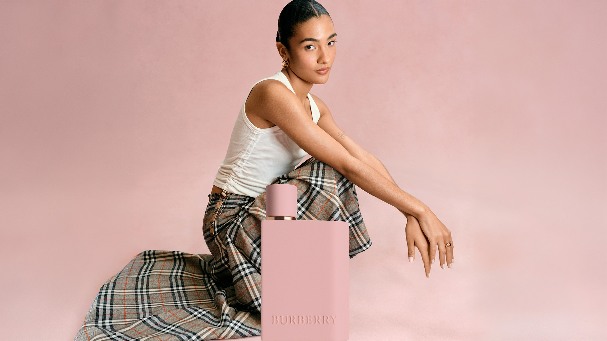 Feminine fashion trends featuring ballet-inspired sneakers, polka dots and playful patterns with figure-skimming dresses and ruffled textures