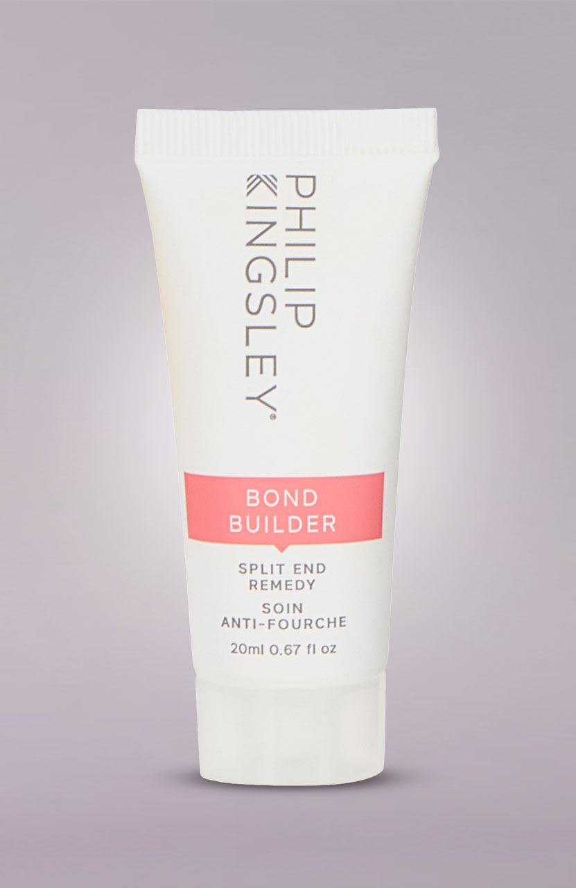 A white tube of Phillip Kingsley Bond Builder Split End Remedy against a light purple background.