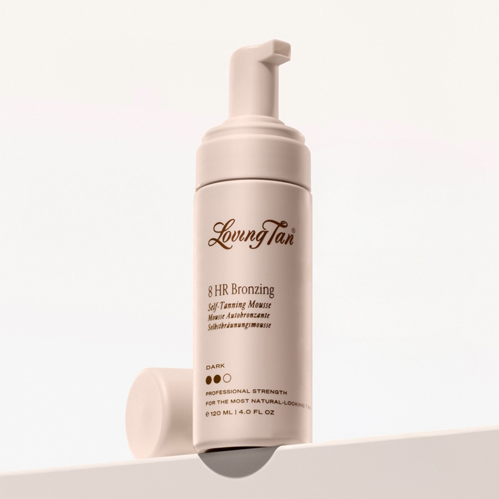 Loving Tan 8 HR Bronzing self-tanning mousse in beige pump bottle on neutral background