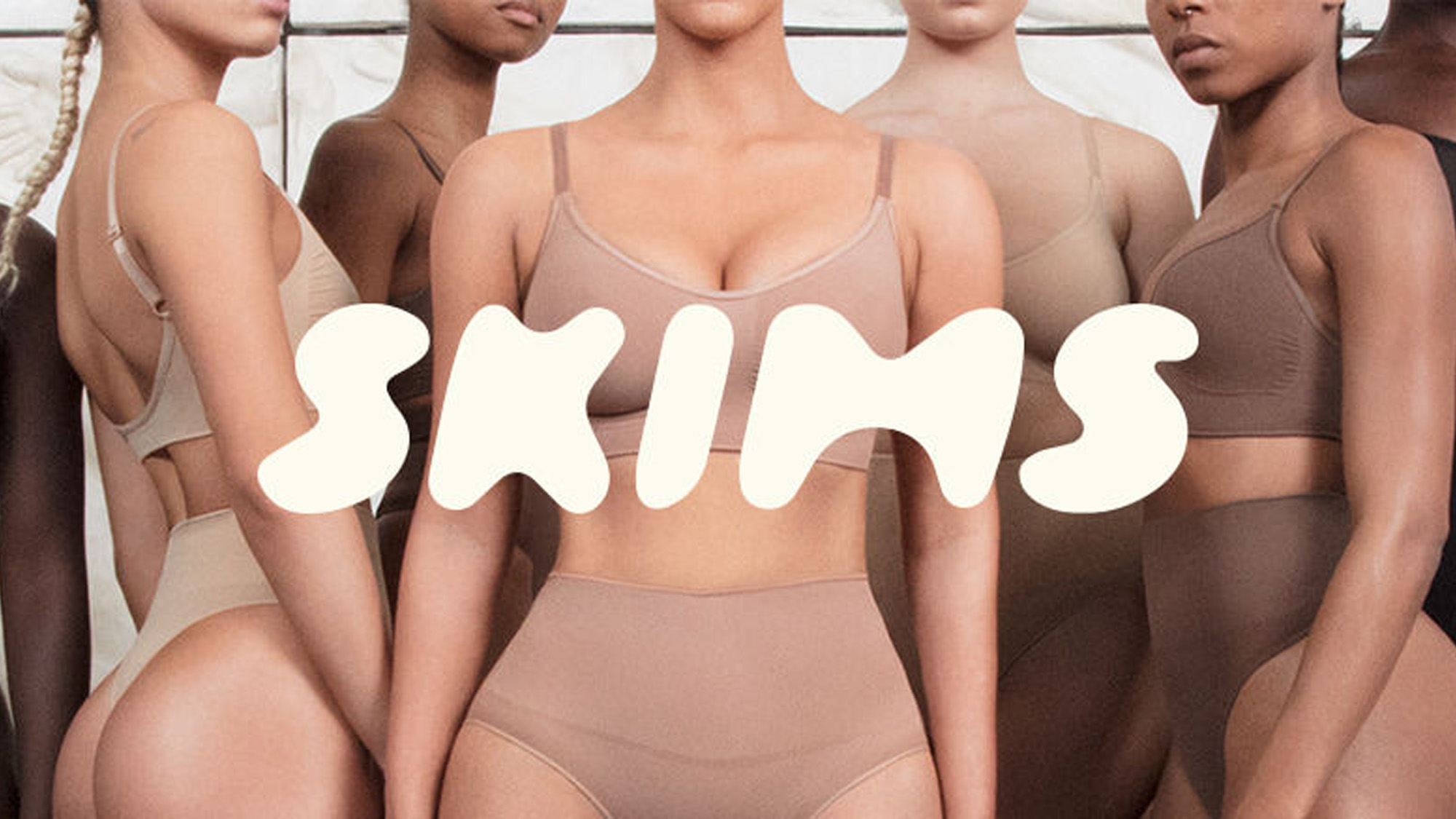models wearing SKIMS with SKIMS logo overlaid