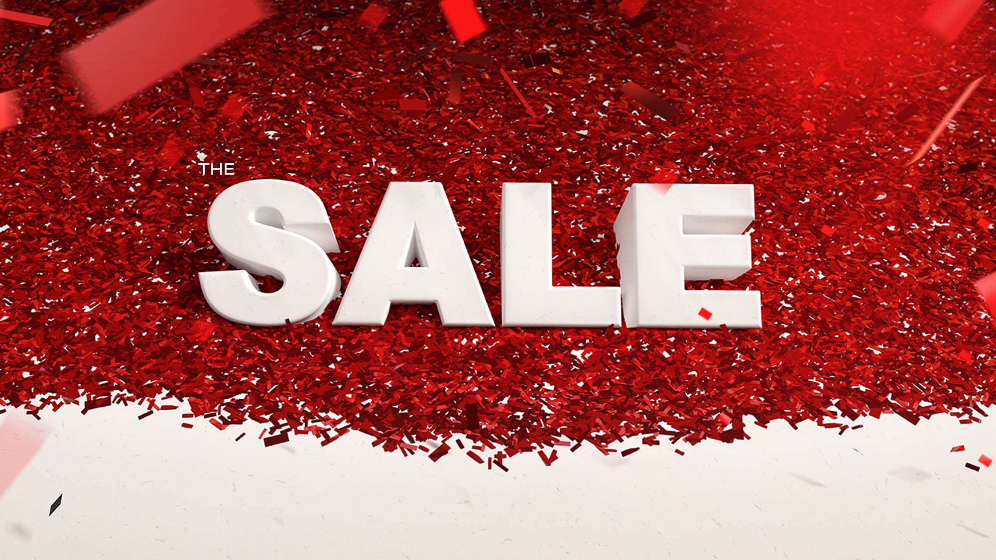 Bold white text 'THE SALE' on a background of red confetti.