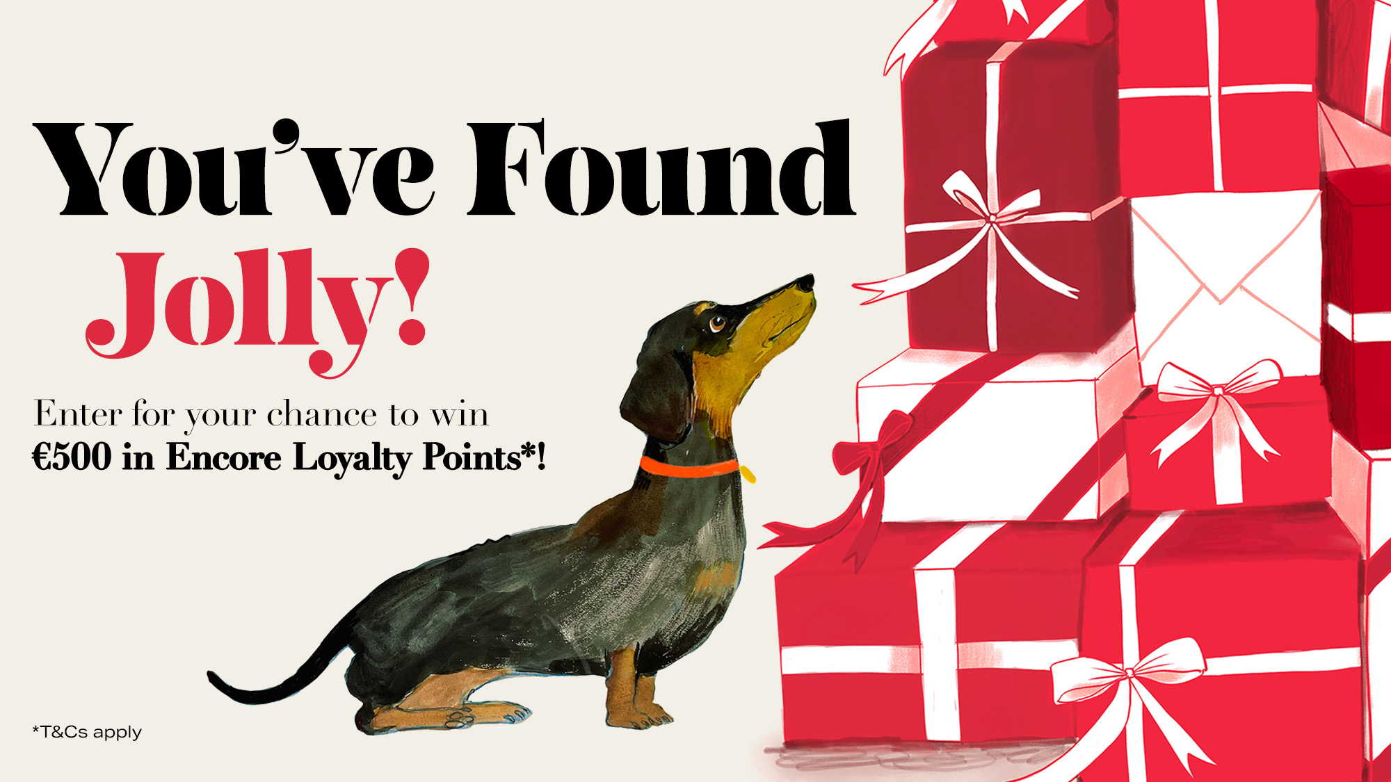A dachshund peers beside stacked red and white gifts. Text reads, 'You've Found Jolly! Enter For Your Chance To Win €500 in Encore Loyalty Points!'