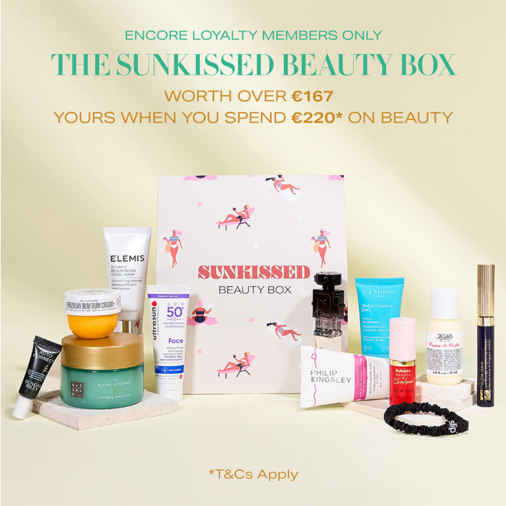 A collection of beauty products displayed around a 'Sunkissed Beauty Box,' offered to members spending over €220, valued at over €167.