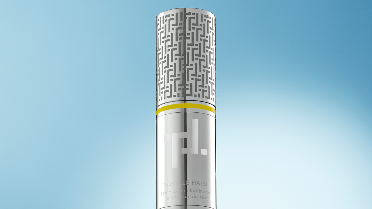 A silver cylindrical container with a patterned cap against a blue gradient background.