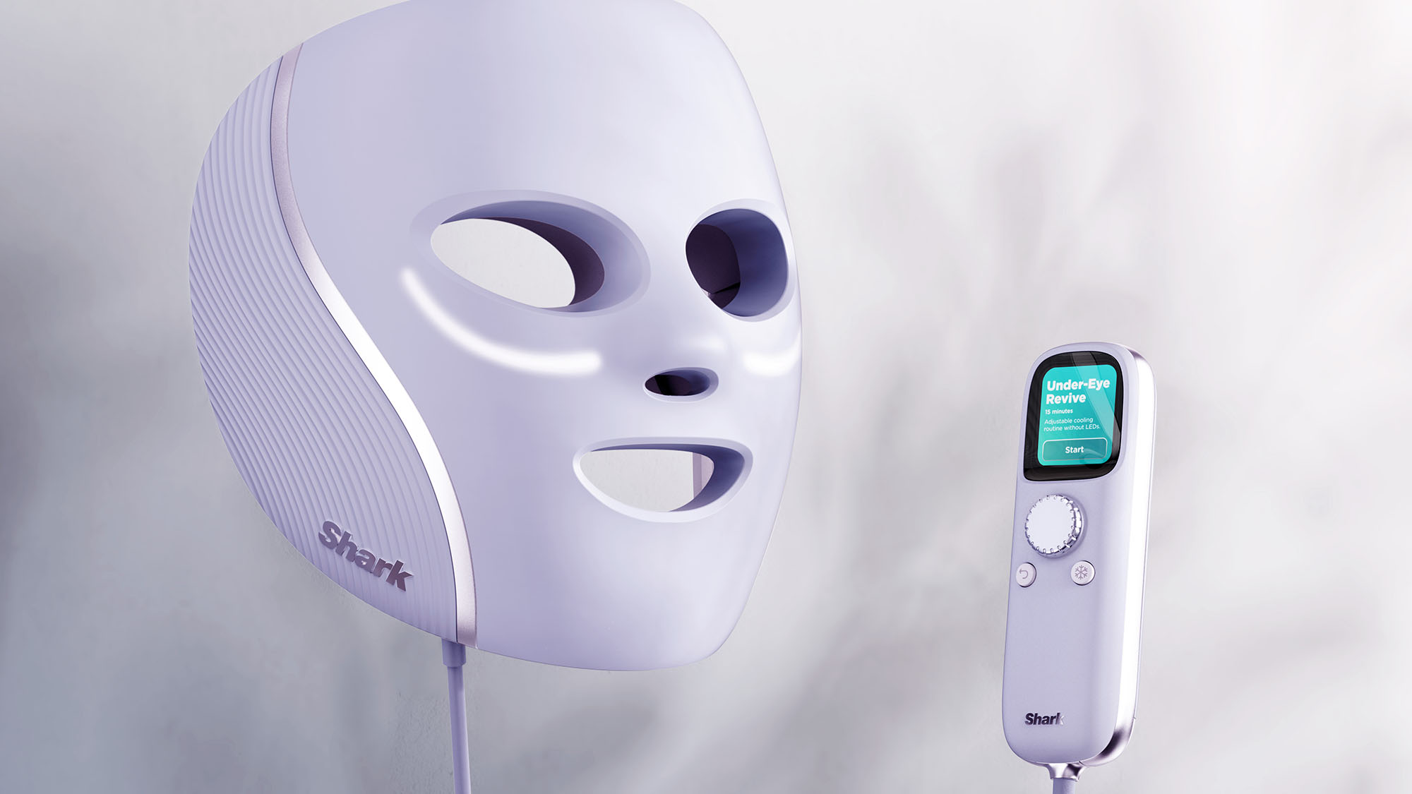 A white futuristic face mask with a connected handheld controller, both displaying the 'Shark' brand.