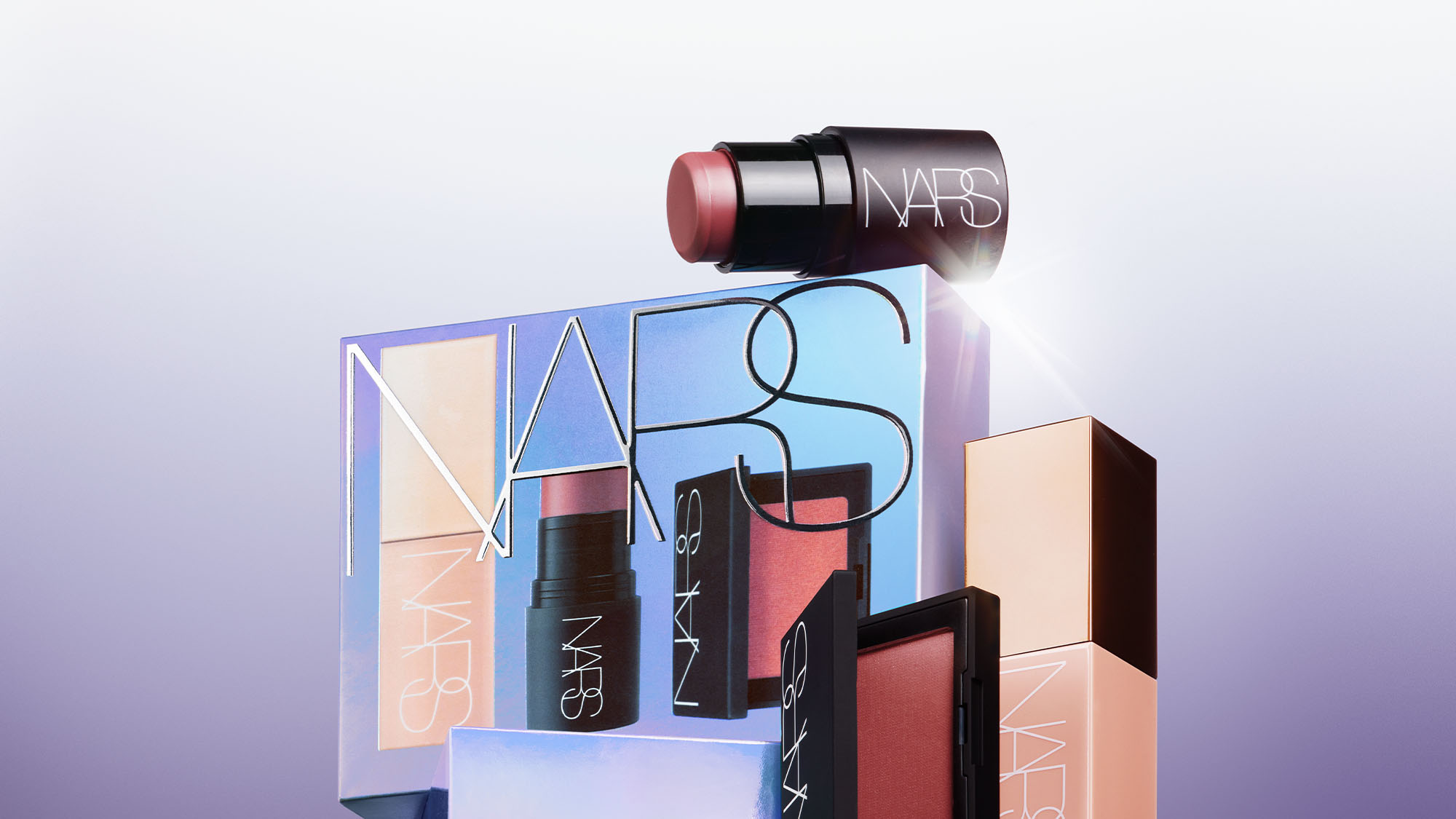 NARS makeup products, including lipstick, blush, and foundation, displayed with packaging against a gradient background.