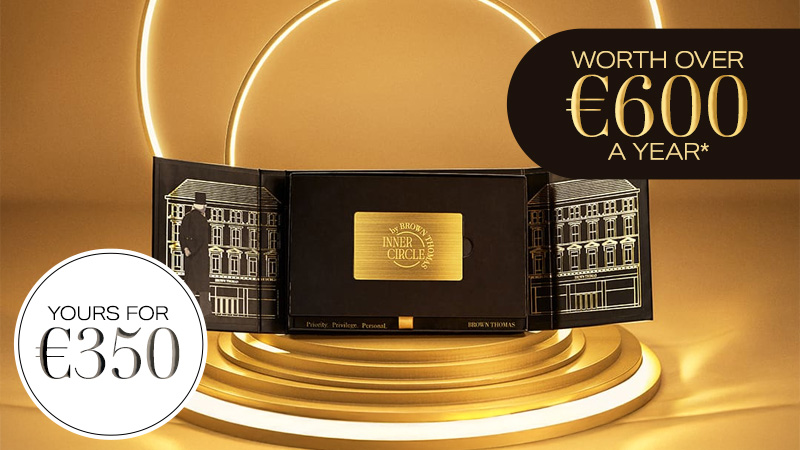 A luxury product display with a black and gold item, priced at €350, with a value over €600 a year, on a golden-lit background.