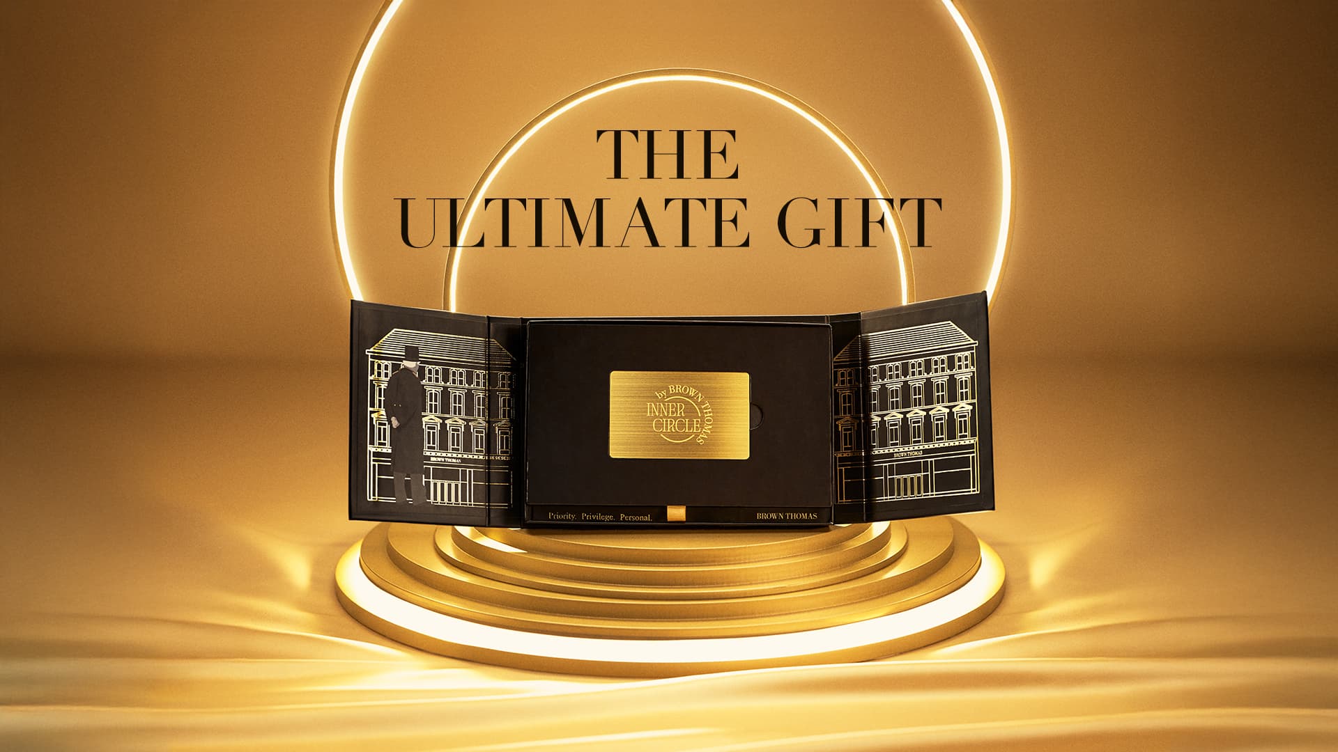 A golden-themed image showing a luxurious gift box displayed under a radiant halo.