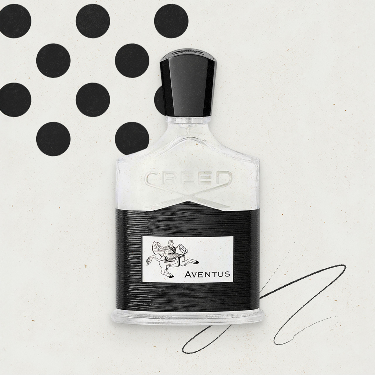A bottle of Creed Aventus perfume with black and white design elements nearby.
